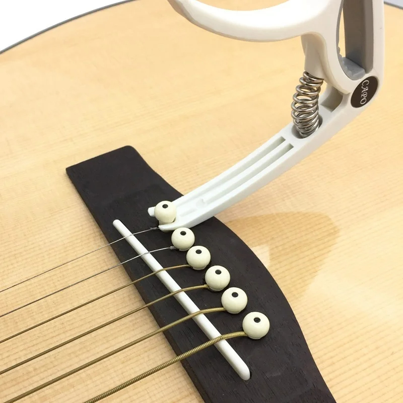 Capotasto per chitarra in plas - Musical Instrument Gif recensione e prezzo